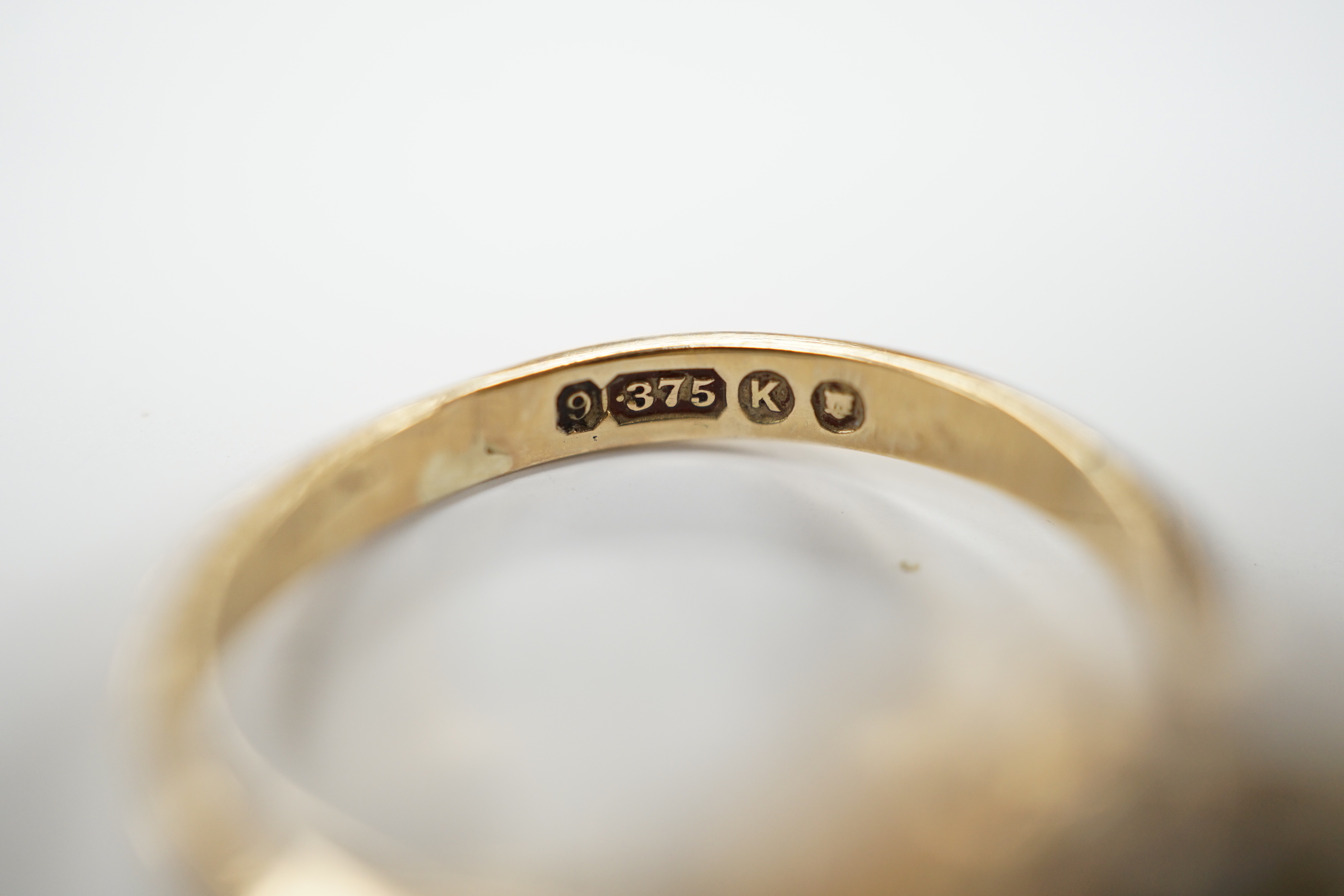 Two 9ct gold cameo rings, size N and Q, and a pearl and sapphire cluster ring, size N